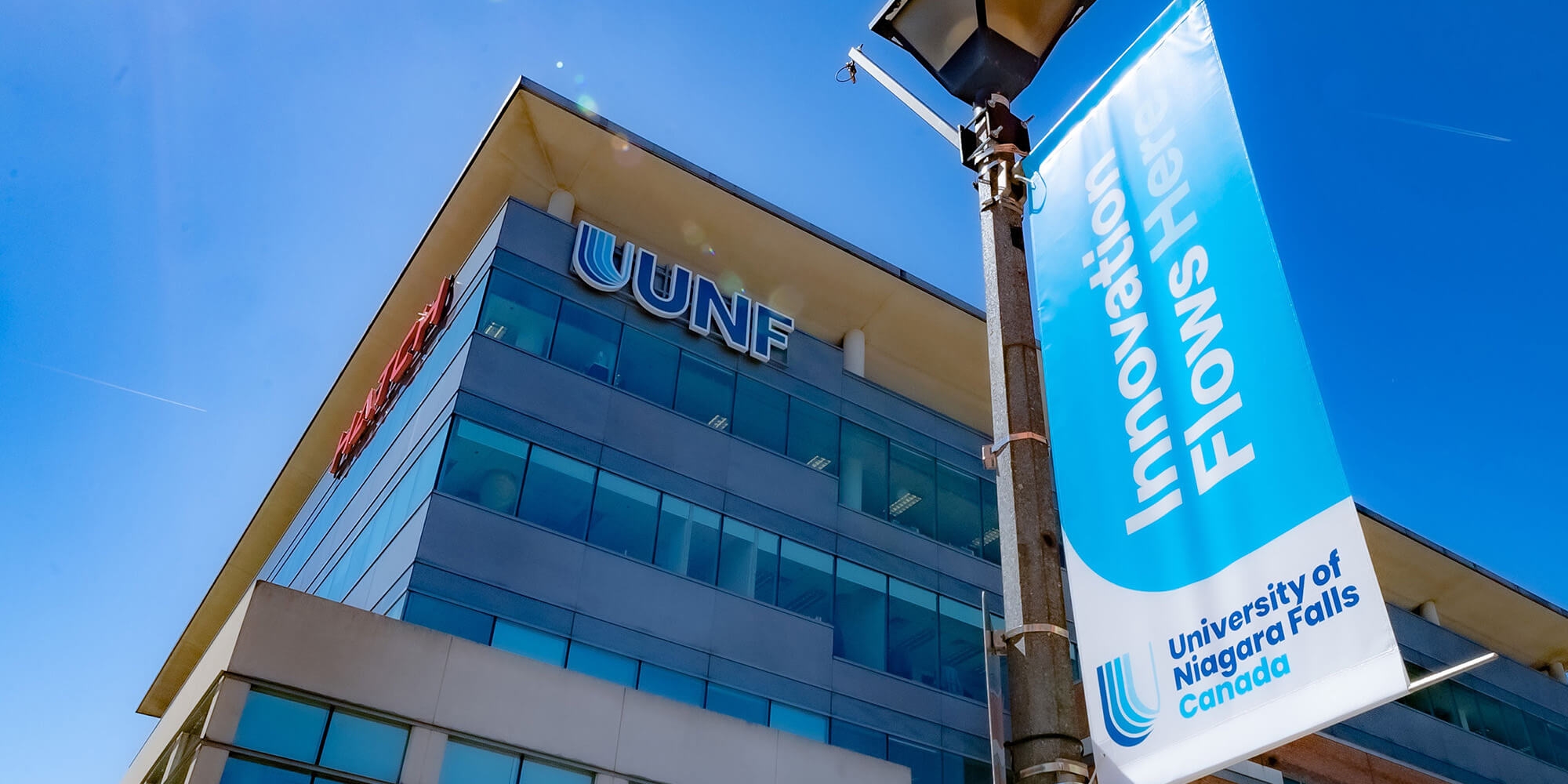 A photo of UNF building with a UNF signage