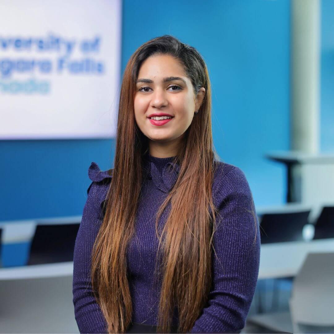 A portrait Savleen Kaur smiling for the camera