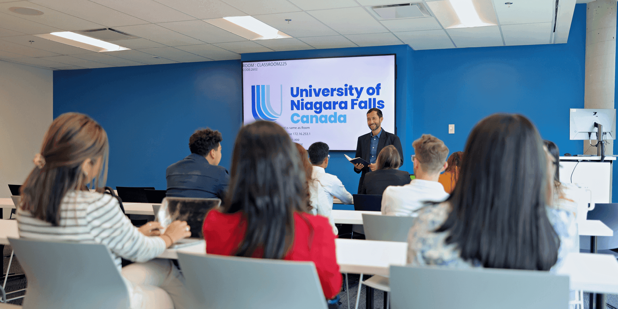 Students listening to a professor inside a UNF classroom