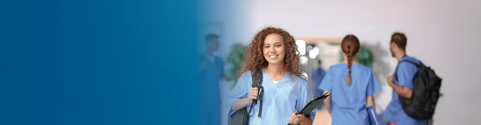 nursing student smiling on the hallway