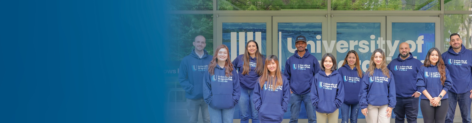 Group of University of Niagara Falls students wearing blue shirts