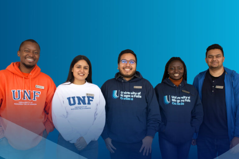 UNF Student Ambassadors posing for photo and smiling